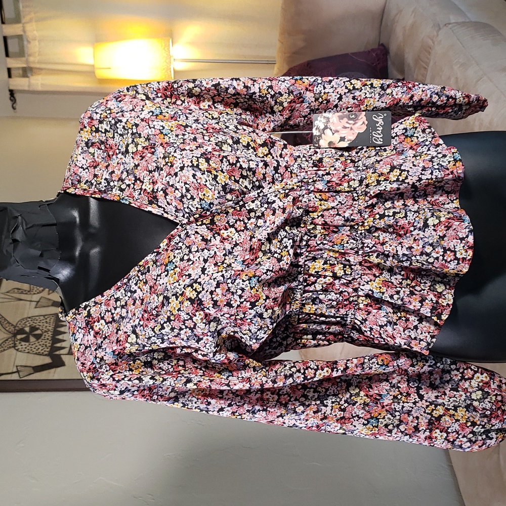 Blush flowered peplum blouse